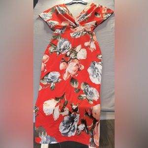 Orange with flower designs very stretchy form fitting great condition size m